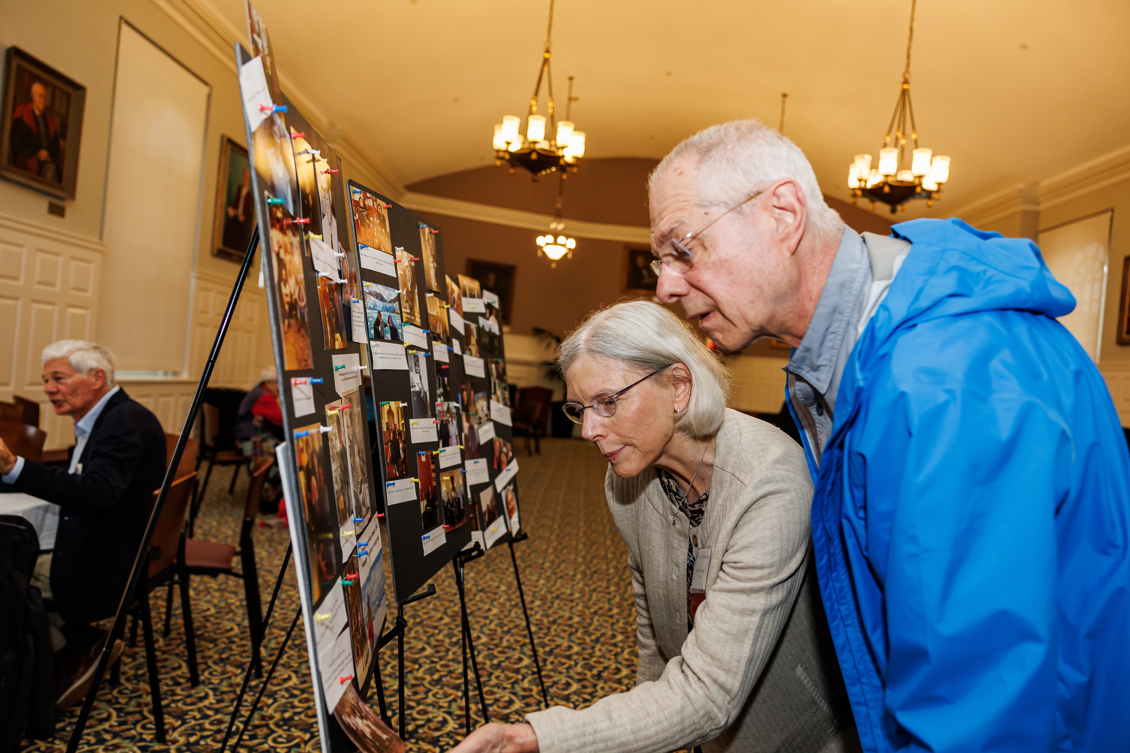 People looking at an easel